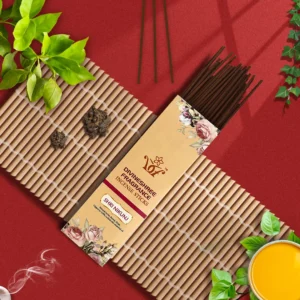 Divineshree Fragrance incense sticks with eco-friendly packaging, fresh leaves, and lemon on red background.